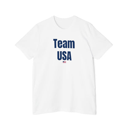 White Team USA T-shirt with bold 'Team USA' text and a small USA flag underneath. Simple patriotic design on a classic fit T-shirt.