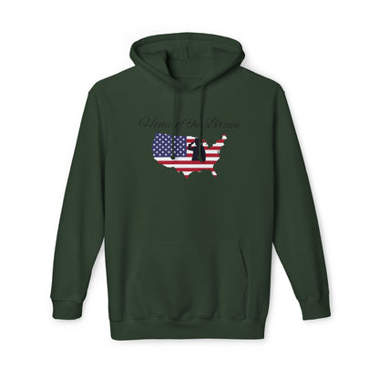 Military green hoodie featuring the phrase 'Home of the Brave' above a silhouette of the United States, with the American flag design filling the silhouette