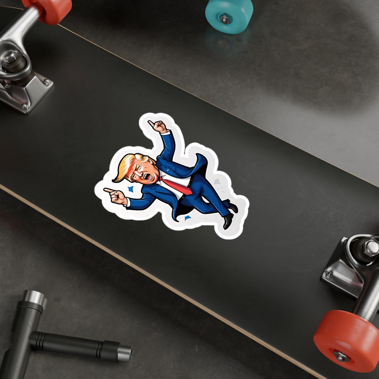 Vinyl car decal of a cartoon looking Donald Trump, dancing with his hands in the air displayed on a skate board