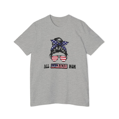 Gray T-shirt with 'All American Mom' text in black and American flag colors, featuring a graphic of a woman’s hair in a bun with a stars and stripes bandana and sunglasses