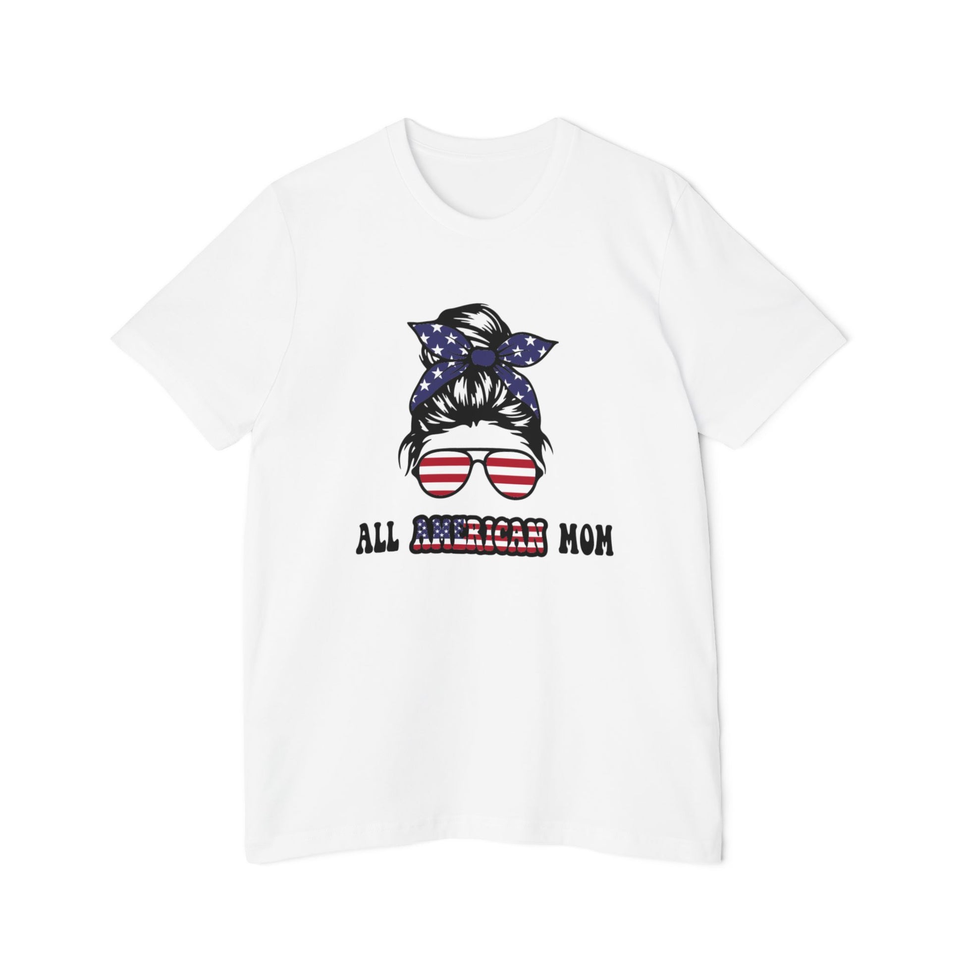 White T-shirt with 'All American Mom' text in black and American flag colors, featuring a graphic of a woman’s hair in a bun with a stars and stripes bandana and sunglasses